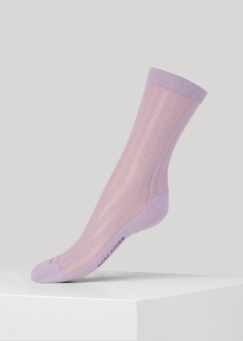 Extremely exclusive dot patterned knit socks made with a strong focus on finesse.