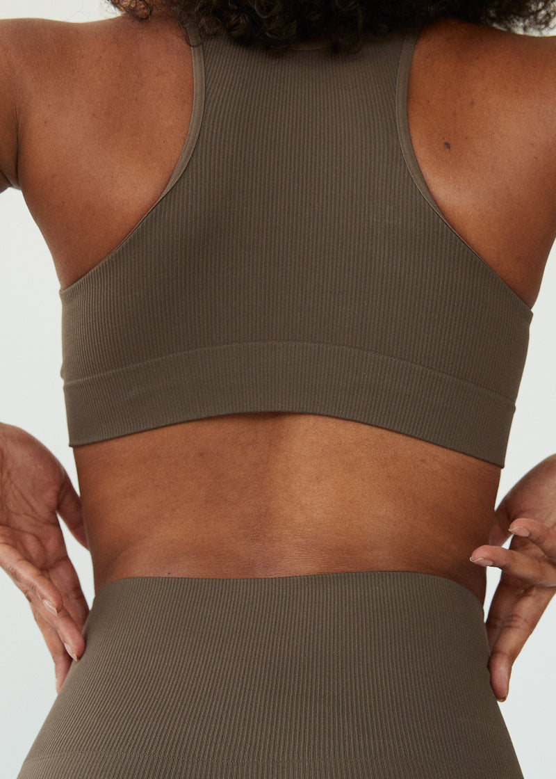 The Lena Seamless Rib Bra is a premium medium impact sports bra, made with recycled materials.