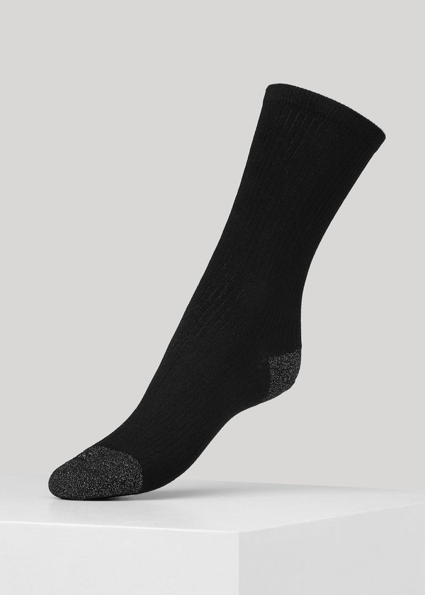 Our Malene ribbed cotton sock in Black with glitter in heel and toes is made of soft GOTS certified premium organic cotton yarn.