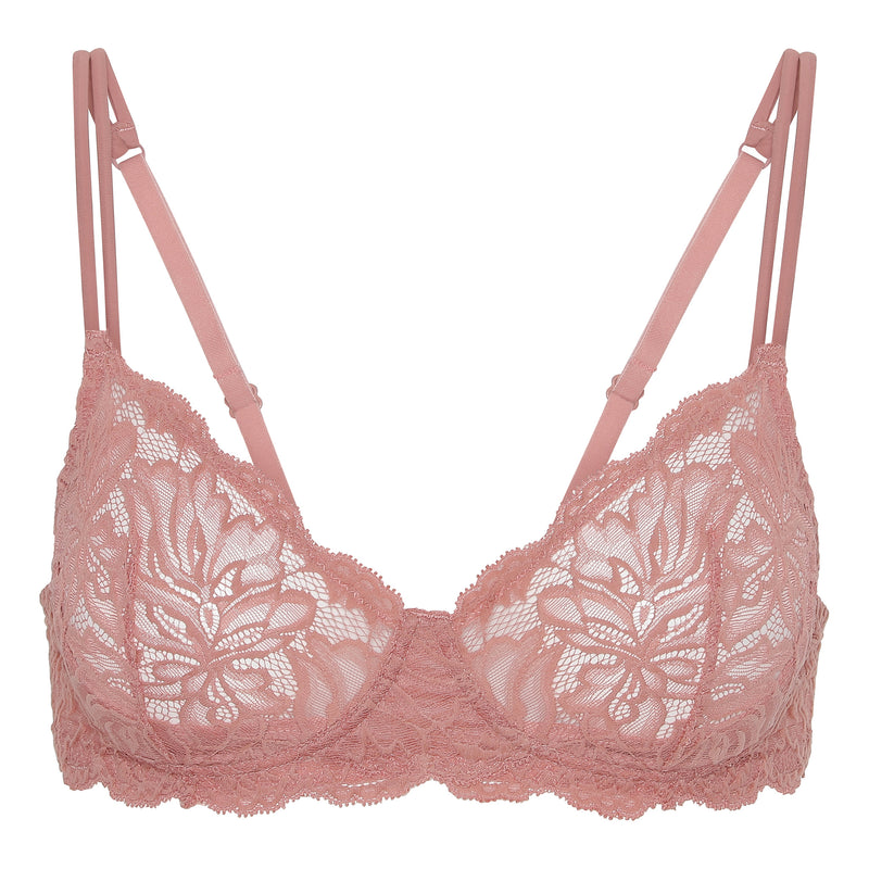 Our Magnolia Bra is cut from soft Italian stretch lace with delicate florals, paired with elegant adjustable double straps. 