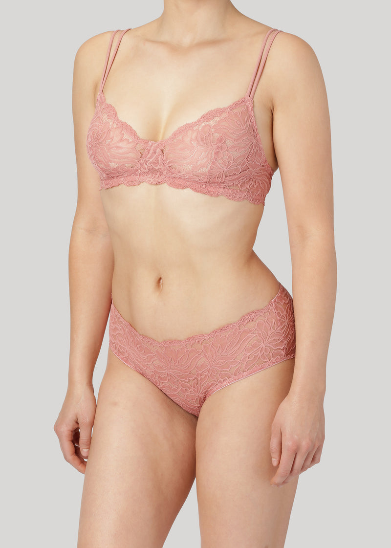 The Magnolia Hipster is cut from soft Italian stretch lace with delicate florals. It has a low-rise fit and is finished with very soft and shiny edge elastics. 