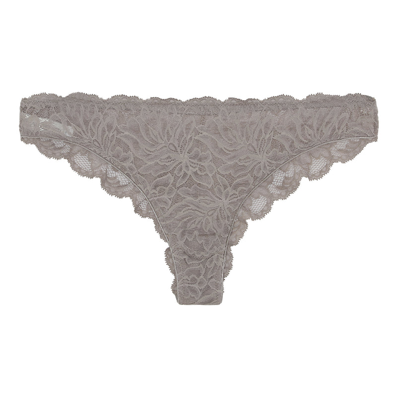 The Magnolia Tanga is cut from soft Italian stretch lace with delicate florals. It has a low-rise fit and is finished with very soft and shiny edge elastics.