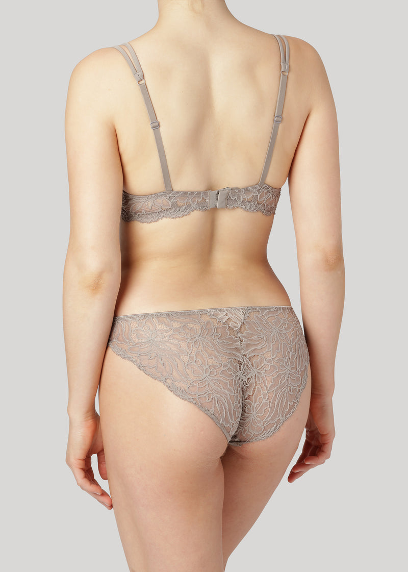 The Magnolia Brief is cut from soft Italian stretch lace with delicate florals. It has a low-rise fit and is finished with very soft and shiny edge elastics. 